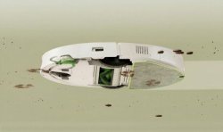 Widok od spodu: iRobot Roomba 115 Combo mopuje plamy na podłodze, z widoczną nakładką z mikrofibry