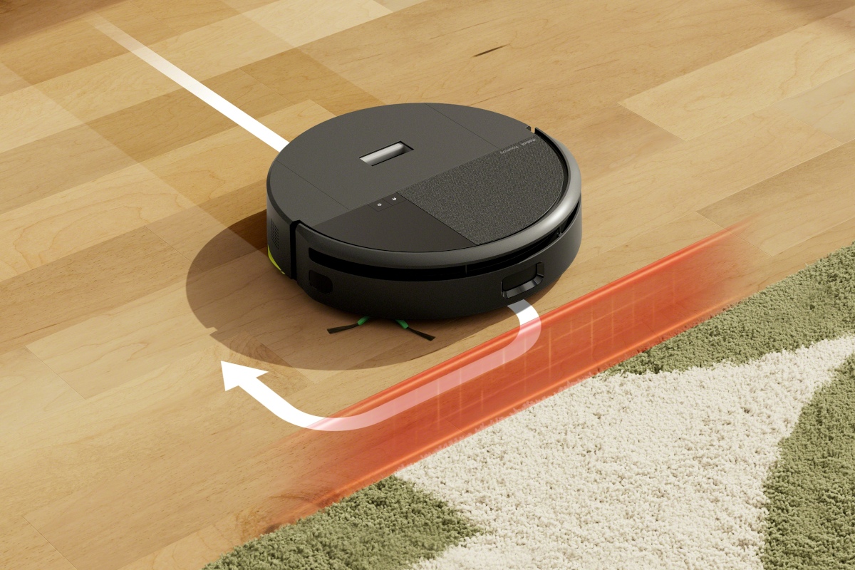 Robot Roomba 205 Combo wykrywa dywan w salonie i omija go, mopując panele