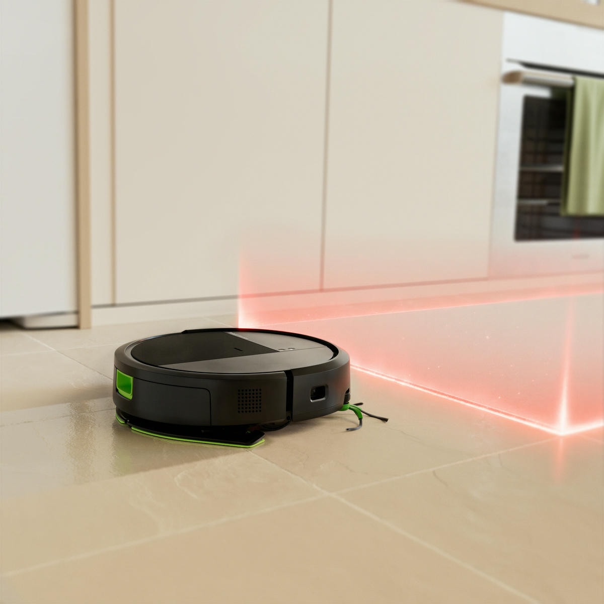 Roomba Combo zatrzymuje się przed strefą bez dostępu ustawioną przy szafkach kuchennych