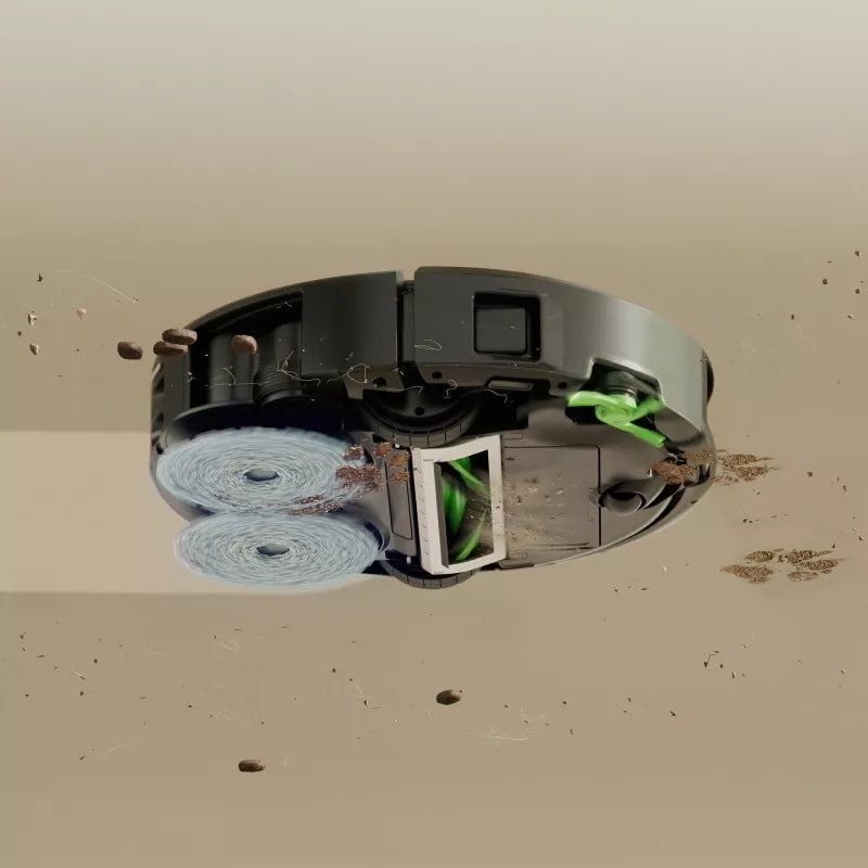Robot Roomba 415 pokazany od spodu jednocześnie odkurza i mopuje twardą podłogę