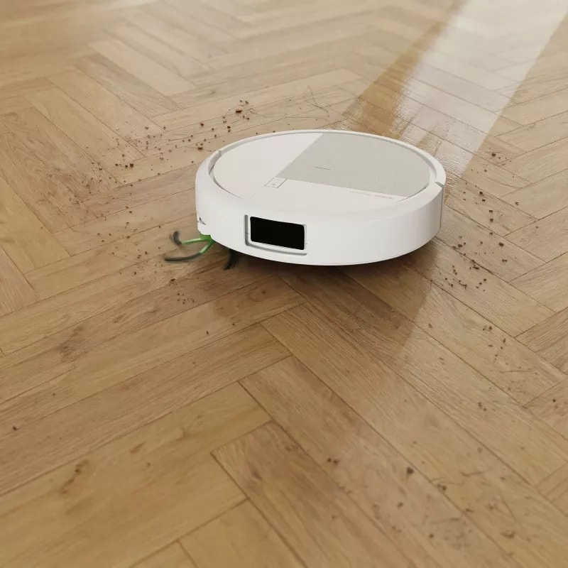 Roomba 415 Combo usuwa plamy z paneli w salonie